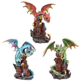 A Fantastic set of 3 Dragon Figurines each clinging to a castle. This set will create a fantastic showcase for dragon lovers and a gift that will look great and be apprciated for years to come. Each figuine ,easures approx. 11cm tall x 3 cm deep and 6 cm wide.