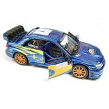 This iconic die cast model Subaru WRC Impreza car has exquisite detail and shows the sponsors and features the W.R.C. World Rally Champion colours. This car measures L 12 cm x W 5 cm x H 4 cm and has opening doors.